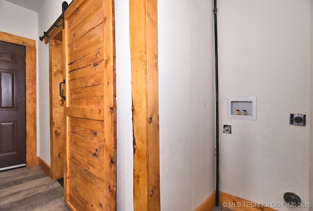 206 S Mounds St, Sapulpa, OK 74066 - laundry room featuring hookup for an electric dryer, hookup for a washing machine, wood finished floors, baseboards, and a barn door