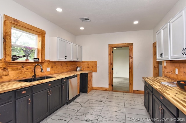 206 S Mounds St, Sapulpa, OK 74066 - kitchen featuring wood counters, a sink, stainless steel dishwasher, light marble finish floors, and recessed lighting