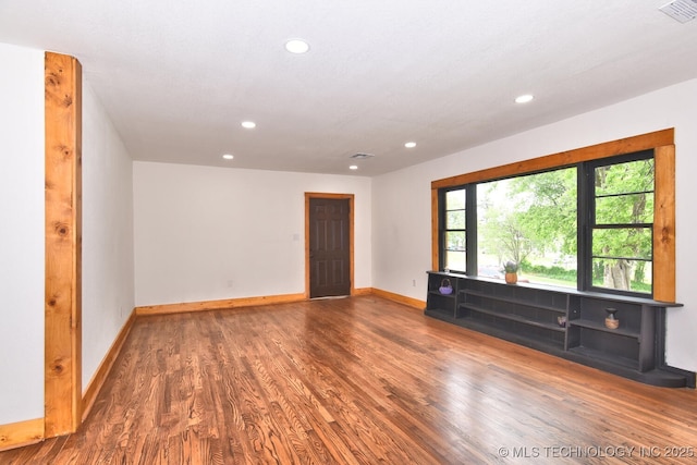 206 S Mounds St, Sapulpa, OK 74066 - unfurnished room with recessed lighting, wood finished floors, and baseboards