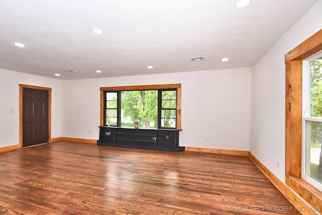 206 S Mounds St, Sapulpa, OK 74066 - spare room with wood finished floors, recessed lighting, and baseboards