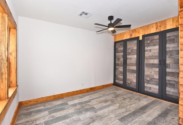 206 S Mounds St, Sapulpa, OK 74066 - empty room featuring wood finished floors, baseboards, and ceiling fan