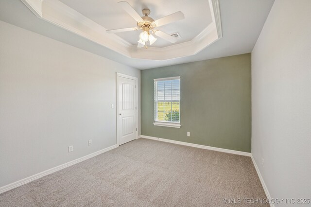 6200 E 340th Rd, Talala, OK 74080 - carpeted empty room with a raised ceiling, ornamental molding, and ceiling fan