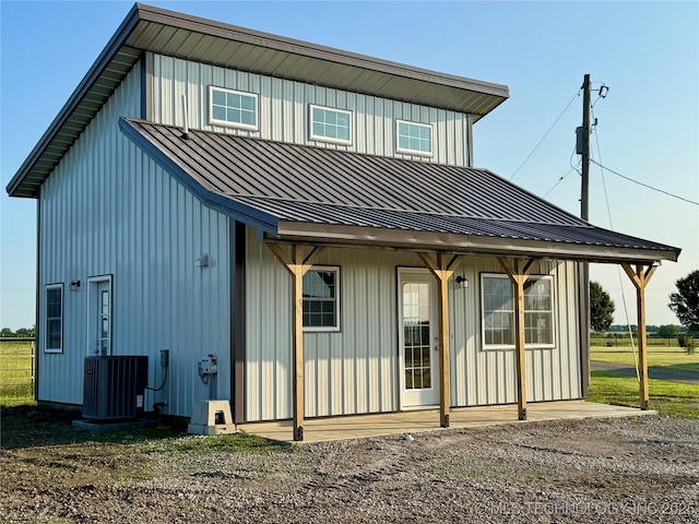 6200 E 340th Rd, Talala, OK 74080 - back of property featuring a metal roof and board and batten siding