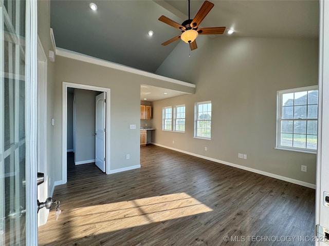 6200 E 340th Rd, Talala, OK 74080 - unfurnished living room featuring a ceiling fan, high vaulted ceiling, dark wood-type flooring, and recessed lighting