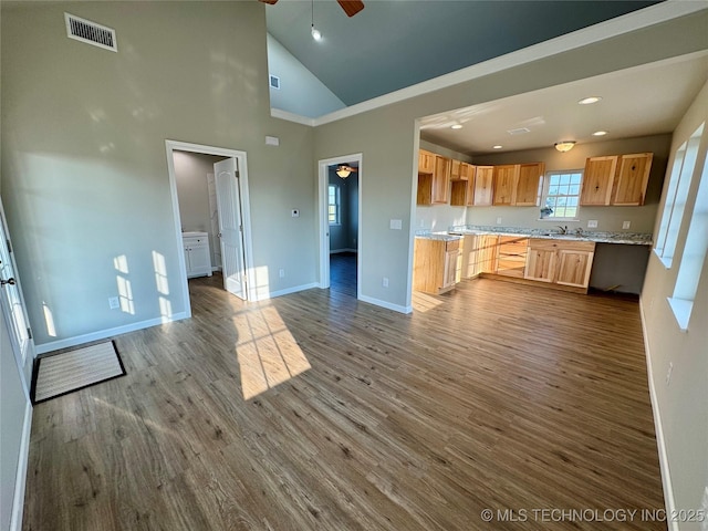 6200 E 340th Rd, Talala, OK 74080 - kitchen featuring ceiling fan, vaulted ceiling, light countertops, dark wood finished floors, and recessed lighting