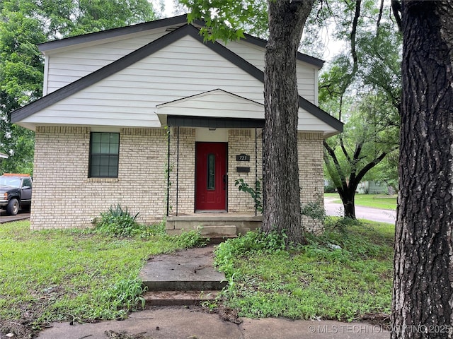 723 N 6th, Durant, OK 74701 - view of front facade featuring brick siding