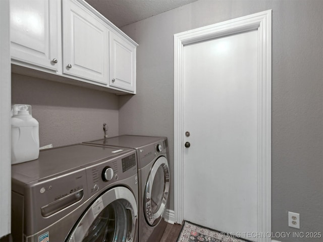 402 Beaumont Dr, Ardmore, OK 73401 - washroom featuring cabinet space, washer and clothes dryer, and dark wood-style floors