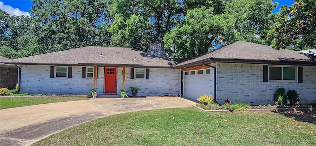 114276 S 4170th Rd, Checotah, OK 74426 - ranch-style home with driveway, a front lawn, an attached garage, a chimney, and brick siding