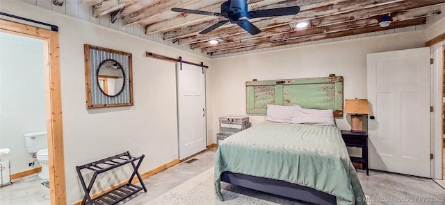 114276 S 4170th Rd, Checotah, OK 74426 - bedroom featuring a barn door, concrete floors, baseboards, and a ceiling fan
