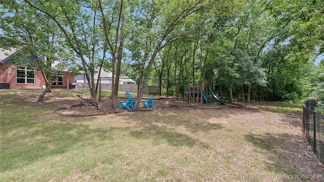 11602 S 30th W Ave, Jenks, OK 74037 - view of yard featuring a playground and central air condition unit