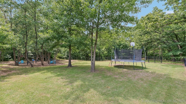 11602 S 30th W Ave, Jenks, OK 74037 - view of yard featuring a trampoline and a playground
