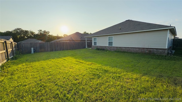 5752 E 147th St S, Bixby, OK 74008 - view of yard at dusk