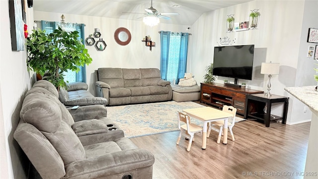 5752 E 147th St S, Bixby, OK 74008 - living area featuring light wood-style floors, ceiling fan, and lofted ceiling