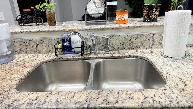 5752 E 147th St S, Bixby, OK 74008 - kitchen view of a sink and light stone countertops