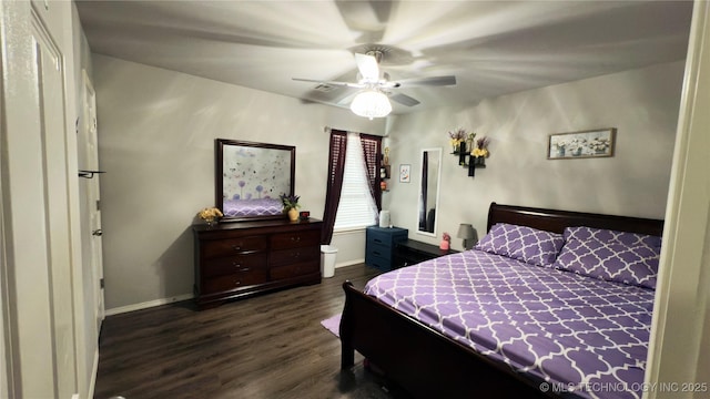 5752 E 147th St S, Bixby, OK 74008 - bedroom featuring dark wood-style floors, baseboards, and a ceiling fan