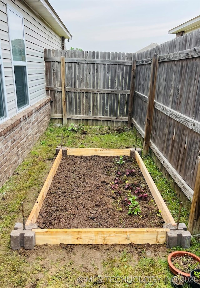 5752 E 147th St S, Bixby, OK 74008 - view of yard featuring a garden