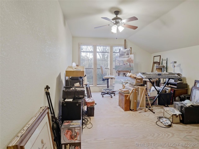 5792 W Lain Lake Rd, Atoka, OK 74525 - home office with a ceiling fan, a textured wall, and lofted ceiling