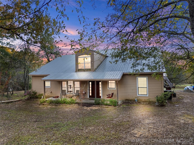 5792 W Lain Lake Rd, Atoka, OK 74525 - view of front of property with covered porch and metal roof