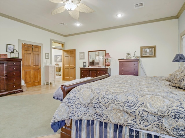 5792 W Lain Lake Rd, Atoka, OK 74525 - bedroom featuring crown molding, carpet floors, a ceiling fan, and connected bathroom