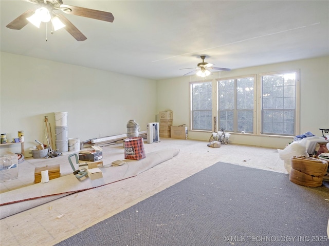 5792 W Lain Lake Rd, Atoka, OK 74525 - living area with a ceiling fan and carpet floors