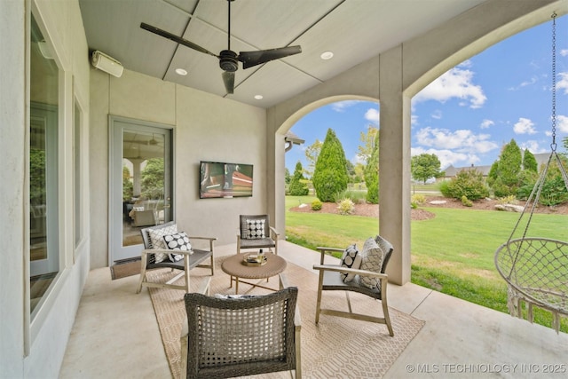 18319 E Red Fox Trl, Owasso, OK 74055 - view of patio / terrace with a ceiling fan and an outdoor living space