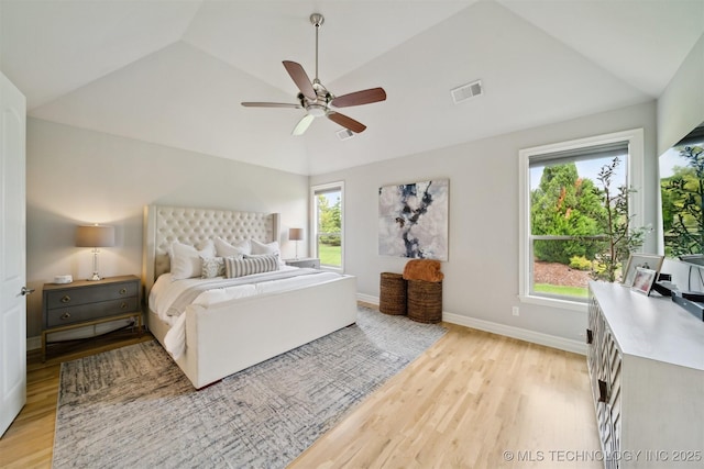 18319 E Red Fox Trl, Owasso, OK 74055 - bedroom featuring vaulted ceiling, light wood-style flooring, baseboards, and a ceiling fan