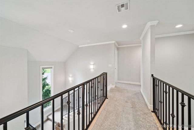 18319 E Red Fox Trl, Owasso, OK 74055 - hallway with an upstairs landing, recessed lighting, baseboards, carpet, and crown molding