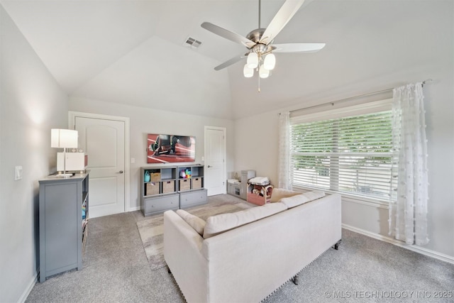 18319 E Red Fox Trl, Owasso, OK 74055 - living area featuring light carpet, vaulted ceiling, ceiling fan, and baseboards