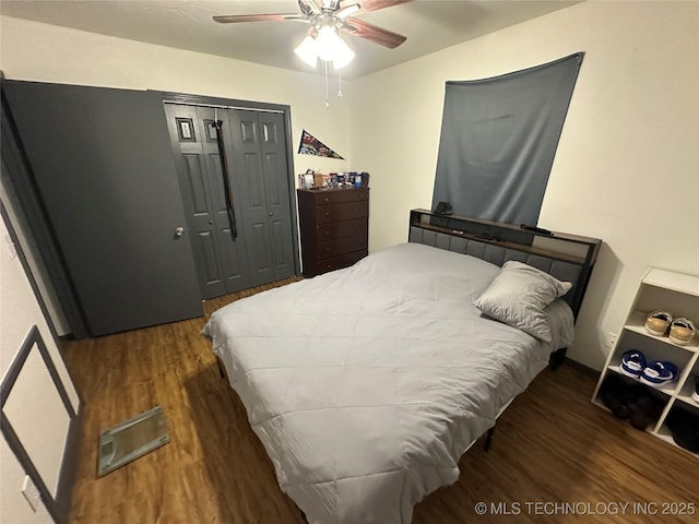 206 I St NE, Ardmore, OK 73401 - bedroom featuring wood finished floors, a closet, and ceiling fan