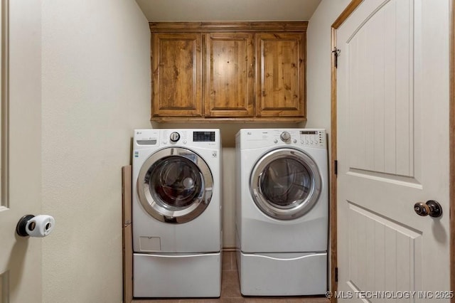233 Murray Pl, Mannford, OK 74044 - laundry area with washer and clothes dryer and cabinet space