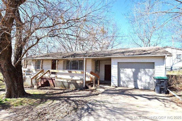 215 S Maple Ave, Tahlequah, OK 74464 - single story home featuring a porch, driveway, an attached garage, and roof with shingles