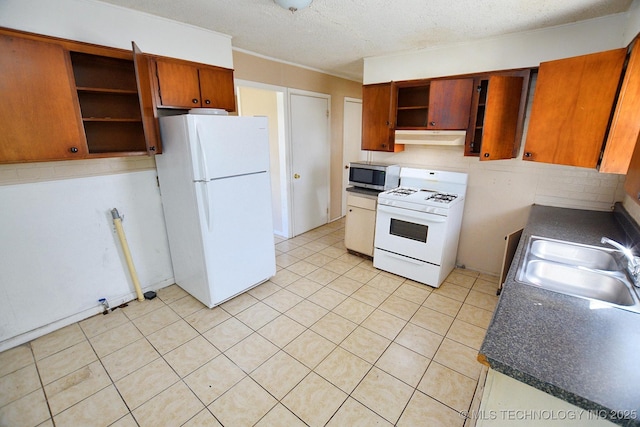 215 S Maple Ave, Tahlequah, OK 74464 - kitchen featuring open shelves, white appliances, under cabinet range hood, dark countertops, and a sink