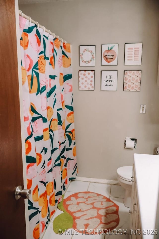 101 Honeysuckle Ln, Pryor, OK 74361 - bathroom with vanity, tile patterned flooring, toilet, baseboards, and a shower with curtain
