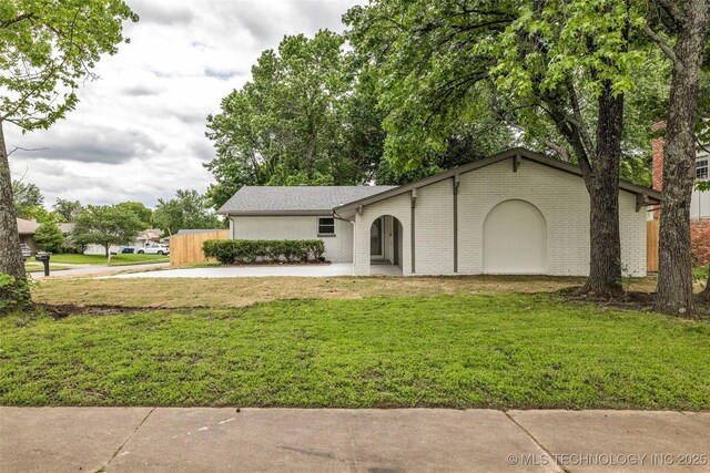 7362 S 68th E Ave, Tulsa, OK 74133 - view of front of property with brick siding