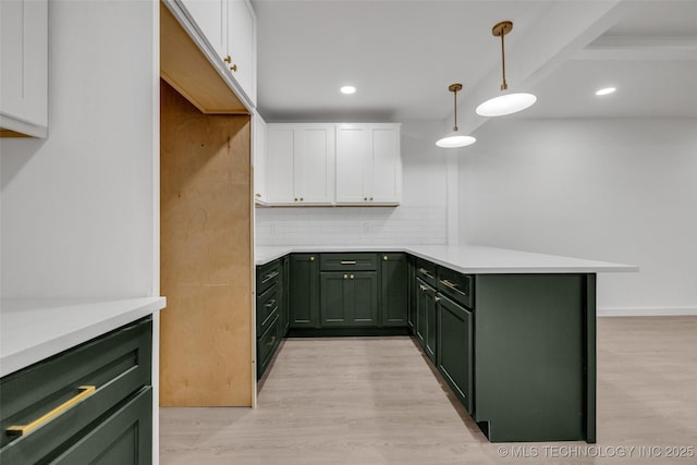 7362 S 68th E Ave, Tulsa, OK 74133 - kitchen with green cabinetry, white cabinetry, a peninsula, and recessed lighting