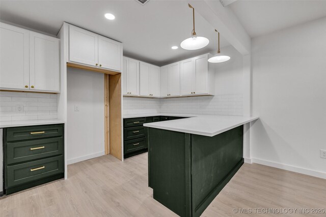 7362 S 68th E Ave, Tulsa, OK 74133 - kitchen with green cabinetry, white cabinets, baseboards, recessed lighting, and beamed ceiling