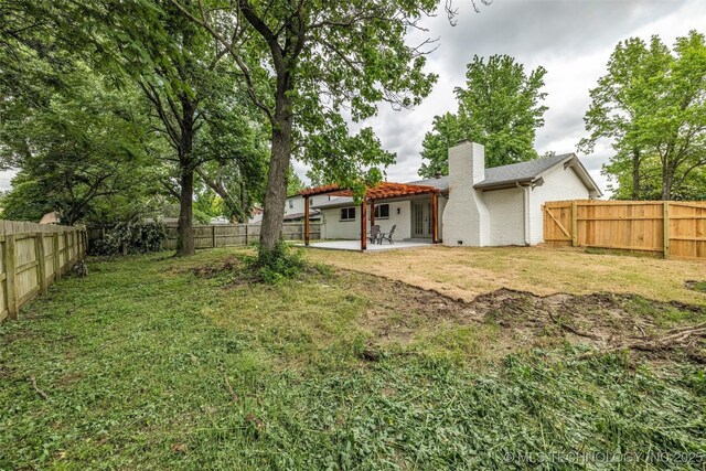 7362 S 68th E Ave, Tulsa, OK 74133 - view of yard with a patio area