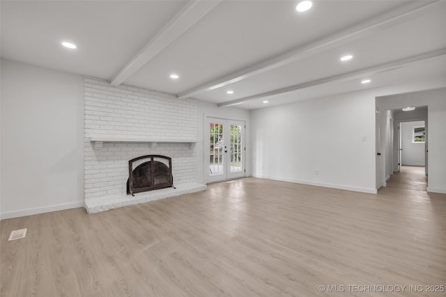 7362 S 68th E Ave, Tulsa, OK 74133 - unfurnished living room with beam ceiling, light wood-type flooring, recessed lighting, baseboards, and a fireplace