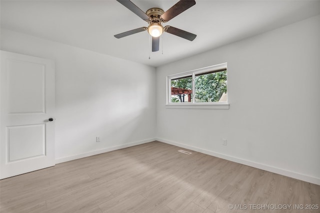 7362 S 68th E Ave, Tulsa, OK 74133 - spare room with wood finished floors, baseboards, and ceiling fan