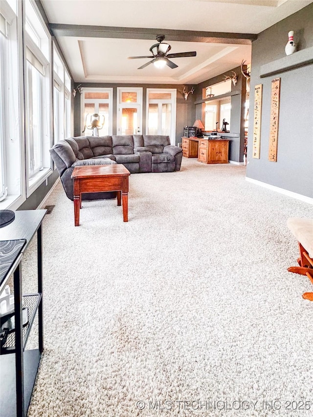 4418 N Little, Cushing, OK 74023 - living room featuring a ceiling fan, baseboards, and carpet flooring