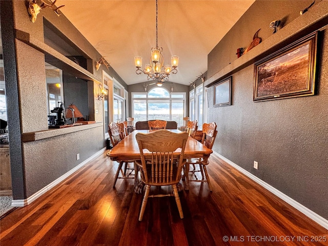 4418 N Little, Cushing, OK 74023 - dining room featuring hardwood / wood-style flooring, vaulted ceiling, a textured wall, a chandelier, and baseboards