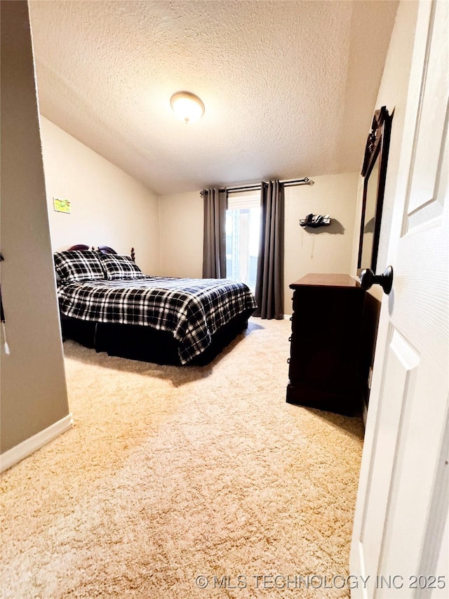 4418 N Little, Cushing, OK 74023 - bedroom with carpet flooring, a textured ceiling, and baseboards