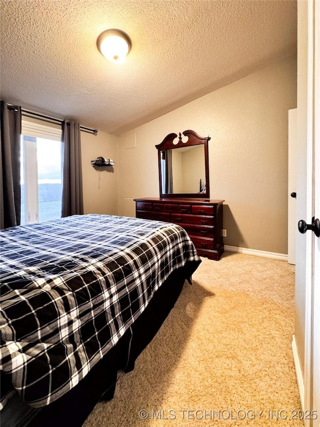 4418 N Little, Cushing, OK 74023 - carpeted bedroom featuring a textured ceiling and baseboards