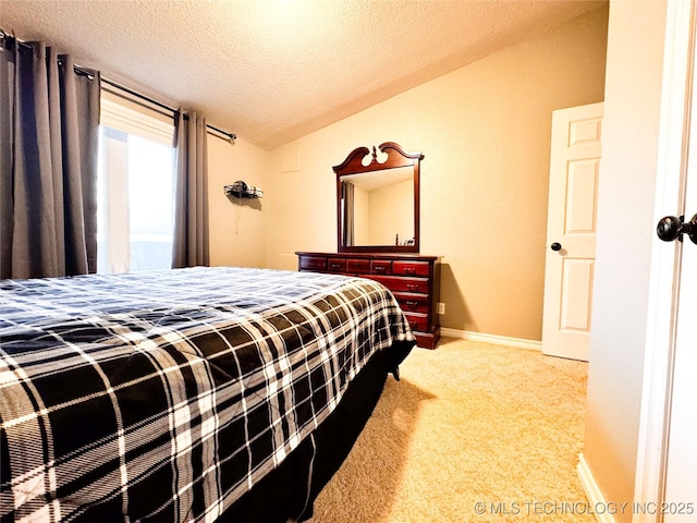 4418 N Little, Cushing, OK 74023 - carpeted bedroom with lofted ceiling, a textured ceiling, and baseboards
