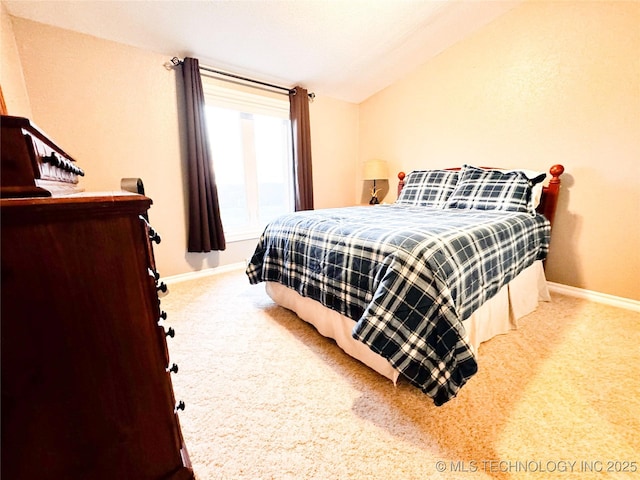 4418 N Little, Cushing, OK 74023 - carpeted bedroom with baseboards and vaulted ceiling