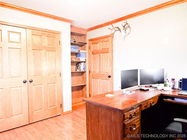4418 N Little, Cushing, OK 74023 - home office with crown molding, light wood-style flooring, and built in shelves