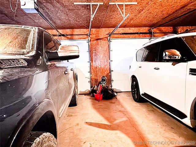 4418 N Little, Cushing, OK 74023 - garage featuring a garage door opener