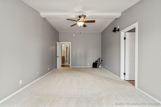 4418 N Little, Cushing, OK 74023 - empty room featuring ceiling fan, carpet, and beam ceiling