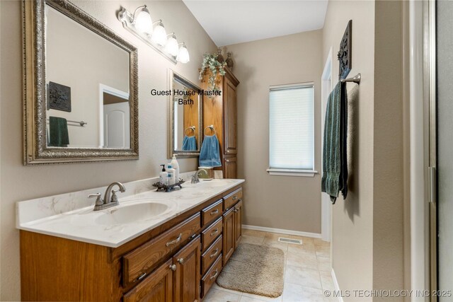 4418 N Little, Cushing, OK 74023 - full bath with double vanity and tile patterned flooring