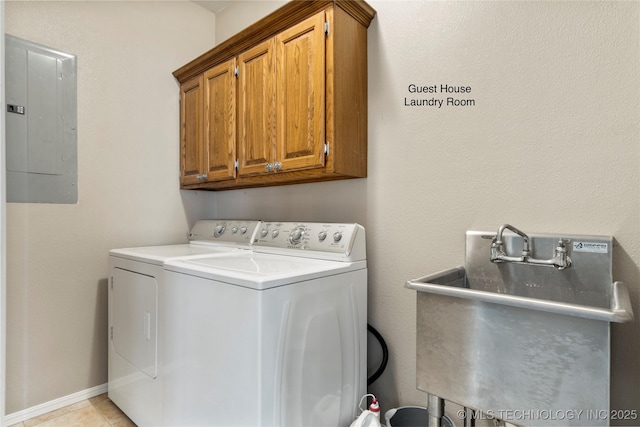 4418 N Little, Cushing, OK 74023 - washroom featuring electric panel, independent washer and dryer, and cabinet space